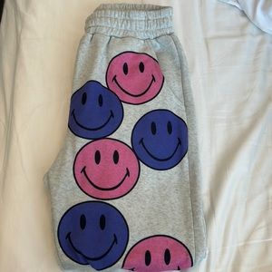 Purple & Pink Smiley Face Sweats